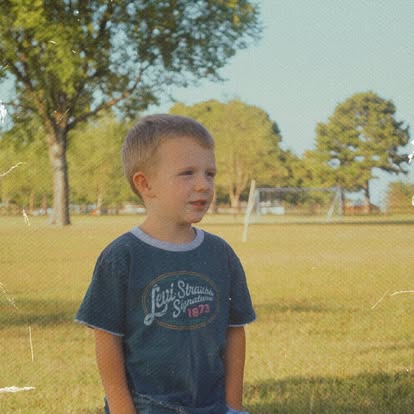 Young boy wearing vintage clothing from Dear Elliemae